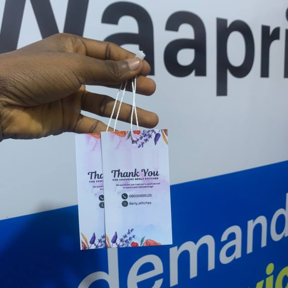 Custom thank-you clothing tags printed by Waaprint