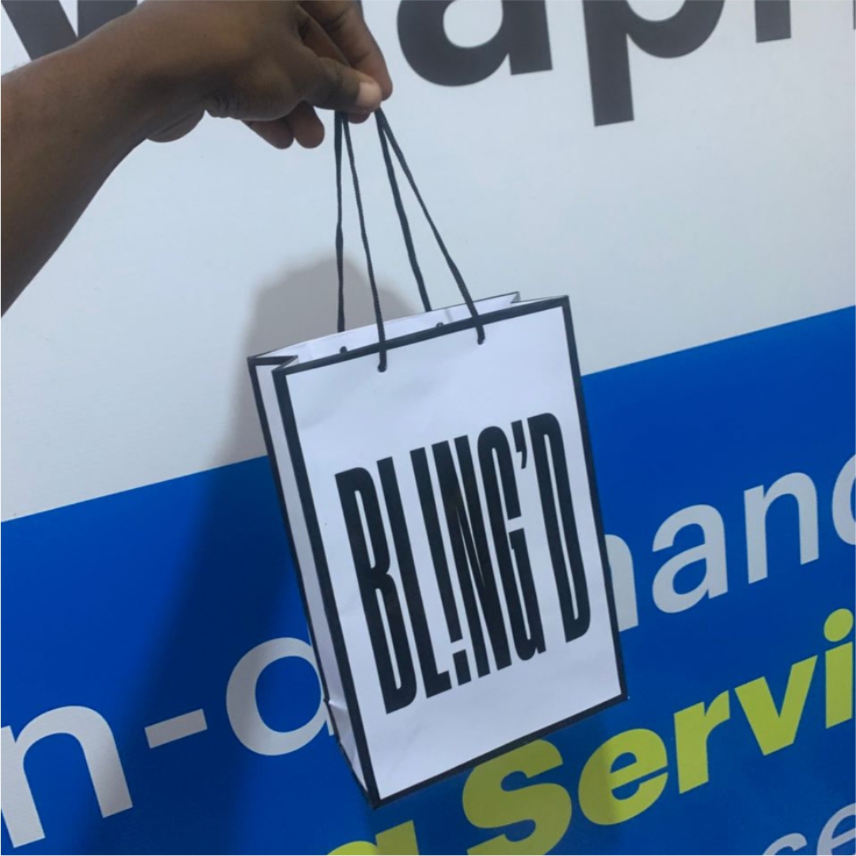 Paper bag with ribbon handle